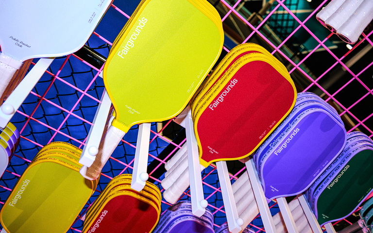 A wall of colourful Fairgrounds paddles